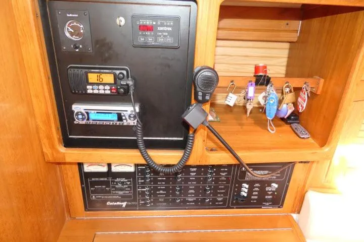 Right Action Yacht Photos Pics Control panel of a 2008 Catalina 400 MK II sailboat with communication equipment.