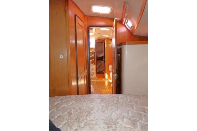 Right Action Yacht Photos Pics Interior view of 2008 Catalina 400 MK II sailboat cabin with wood finish.