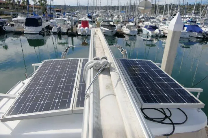 Right Action Yacht Photos Pics Solar panels on a 2008 Catalina 400 MK II yacht in a marina.