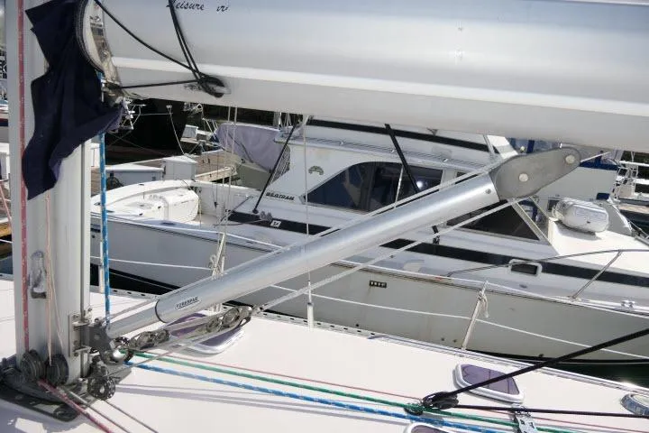 Right Action Yacht Photos Pics Catalina 400 MK II sailboat, 2008 model, docked with visible rigging and neighboring boats.