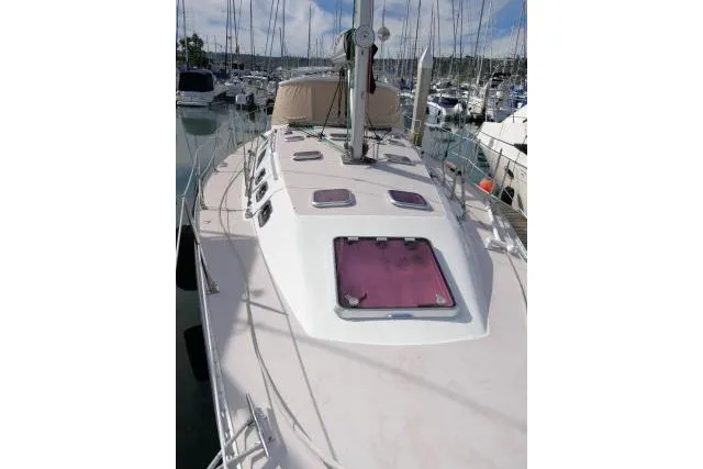 Right Action Yacht Photos Pics 2008 Catalina 400 MK II sailboat deck view in marina setting.
