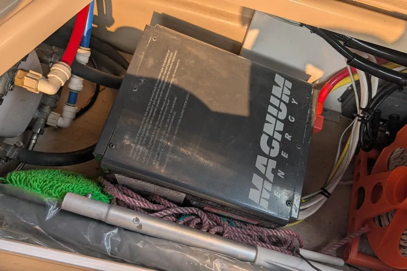 Kameleon Yacht Photos Pics Magnum Energy system in 2017 Cutwater C28 boat, surrounded by wiring and equipment.