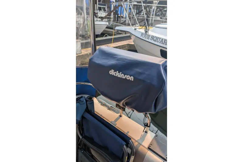 Kameleon Yacht Photos Pics 2017 Cutwater C28 boat with Dickinson grill cover at marina.