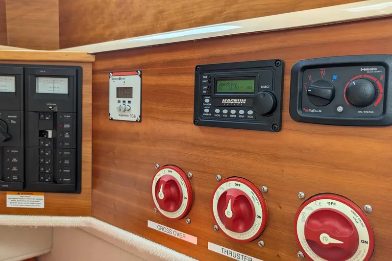 Kameleon Yacht Photos Pics Control panel of a 2017 Cutwater C28 boat with various switches and meters.