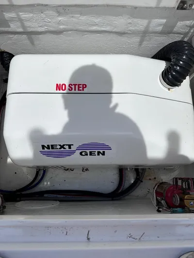 No Name Yacht Photos Pics 2016 Intrepid 375 Walkaround Next Gen generator with 'No Step' warning.