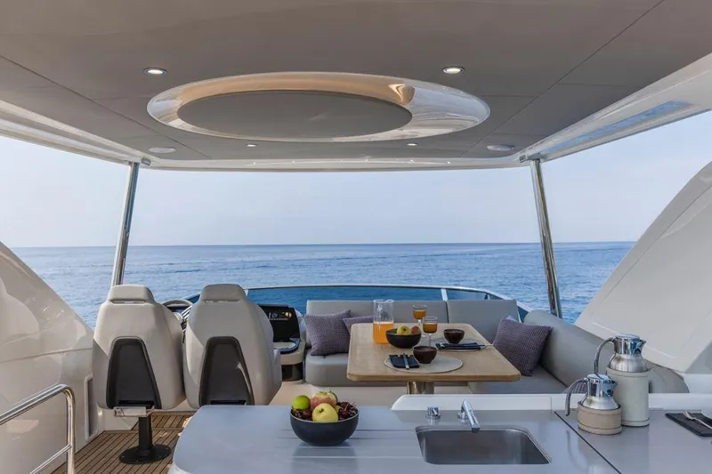 Absolute 52 Fly Yacht Photos Pics Luxurious interior of 2025 Absolute 52 FLY yacht with ocean view.