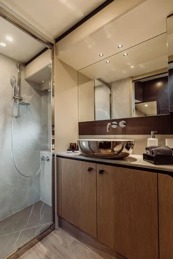 Absolute 52 Fly Yacht Photos Pics Luxurious bathroom in 2025 Absolute 52 FLY yacht with modern fixtures and elegant design.