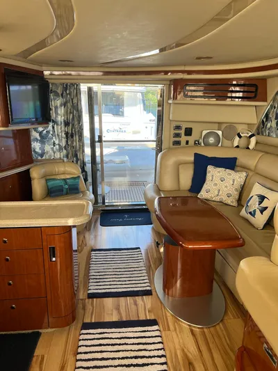  Yacht Photos Pics Luxurious interior of a 2003 Sea Ray 480 Sedan Bridge yacht with elegant furnishings.