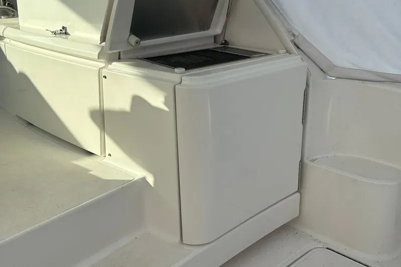 Nomad Yacht Photos Pics 2019 Tiara Yachts 39 Open interior detail, featuring a sleek white compartment.