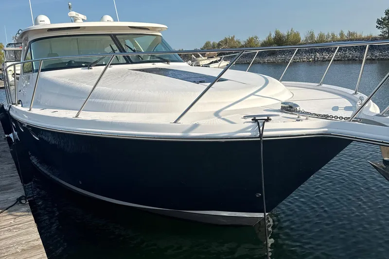 Nomad Yacht Photos Pics 2019 Tiara Yachts 39 Open docked, showcasing sleek design and modern features.