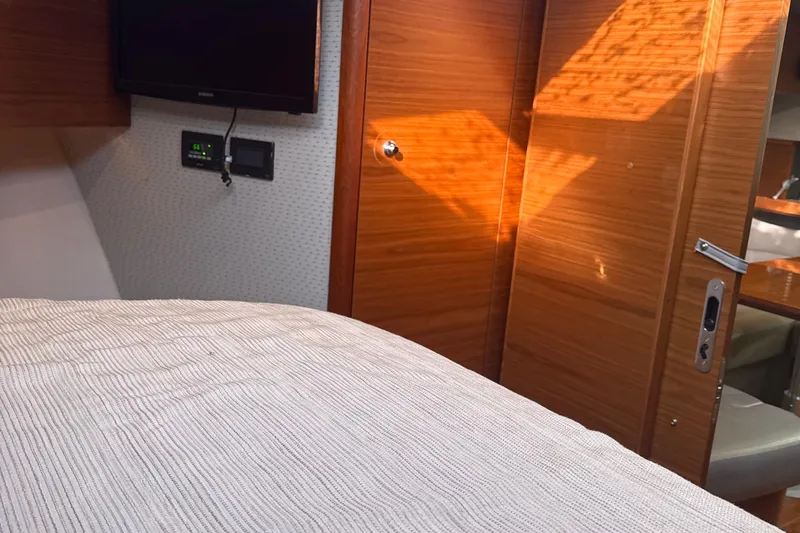 Nomad Yacht Photos Pics Interior of 2019 Tiara Yachts 39 Open, featuring cozy cabin and modern amenities.