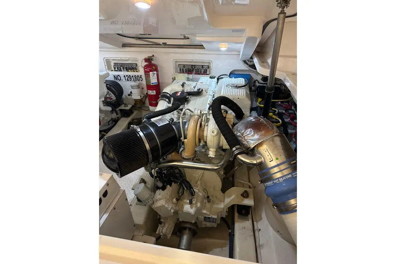 Nomad Yacht Photos Pics Engine room of 2019 Tiara Yachts 39 Open, showcasing detailed mechanical components.