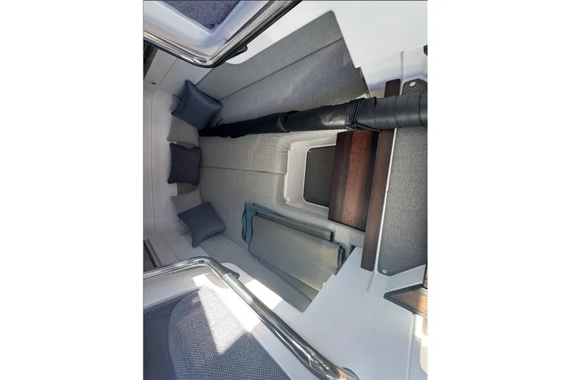  Yacht Photos Pics 2024 Axopar 37 XC CROSS CABIN interior with cushions and sleek design.