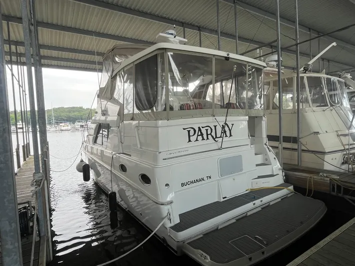  Yacht Photos Pics 1999 Silverton 392 Aft Cabin yacht docked in a marina, Buchanan, TN.