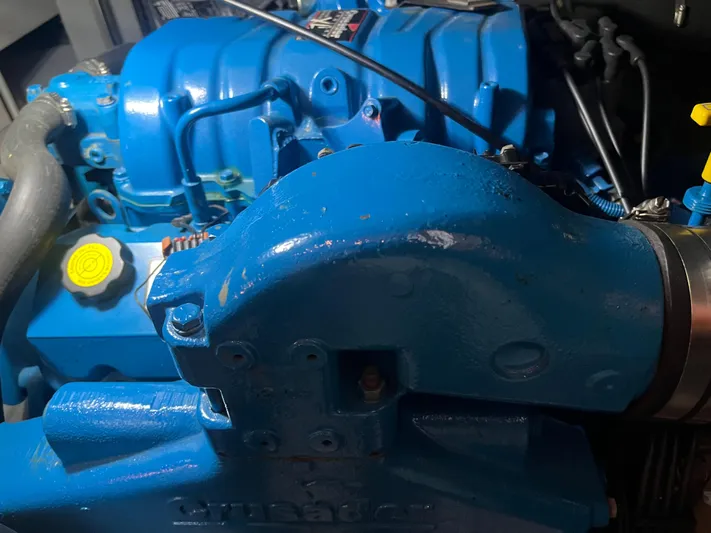  Yacht Photos Pics Close-up of a blue engine component in a 1999 Silverton 392 Aft Cabin boat.