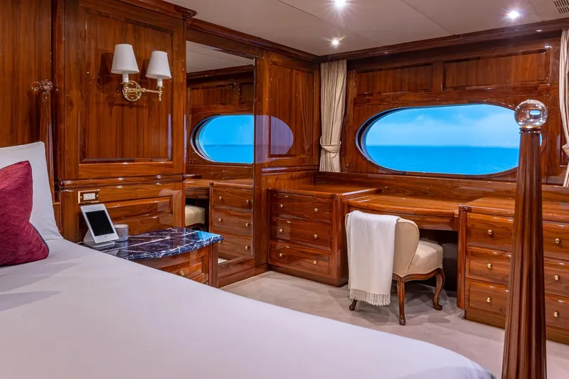 Amore Yacht Photos Pics Luxurious 2005 Christensen motor yacht cabin with elegant wood interior and ocean view.