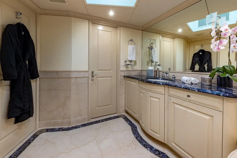 Amore Yacht Photos Pics Luxurious bathroom on 2005 Christensen Motor Yacht with marble accents and elegant decor.