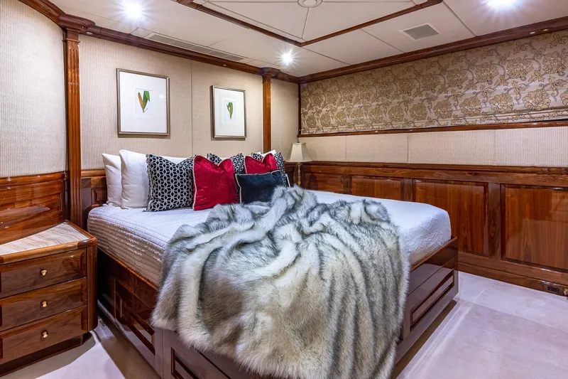 Amore Yacht Photos Pics Luxurious 2005 Christensen motor yacht bedroom with elegant decor and plush bedding.