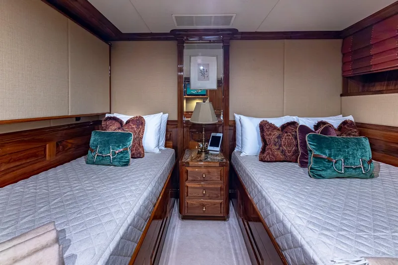 Amore Yacht Photos Pics Luxurious 2005 Christensen motor yacht bedroom with twin beds and elegant decor.