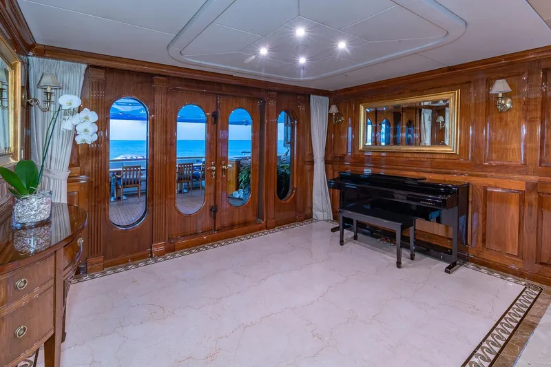 Amore Yacht Photos Pics Luxurious 2005 Christensen motor yacht interior with elegant wood paneling and ocean view.
