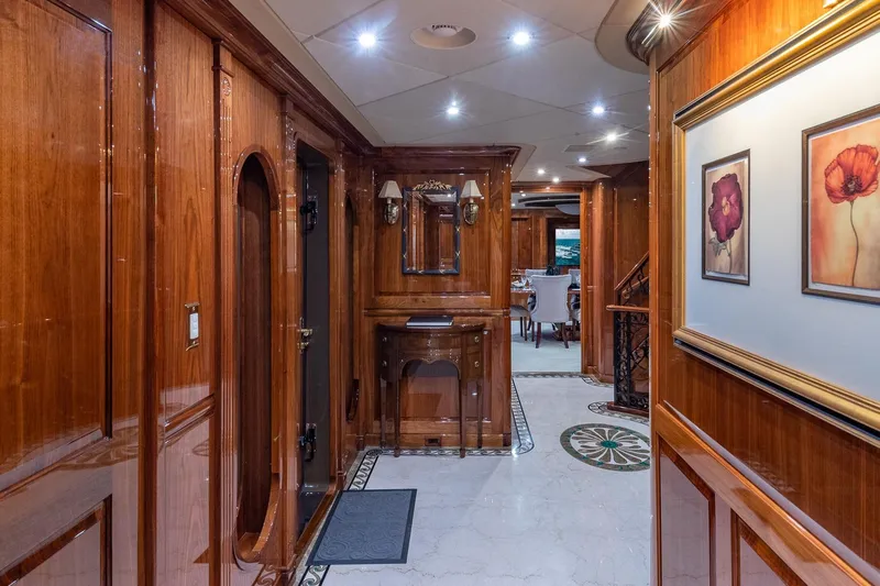 Amore Yacht Photos Pics Luxurious interior of 2005 Christensen motor yacht with polished wood and elegant decor.