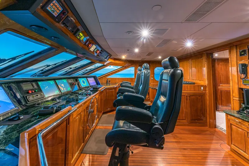 Amore Yacht Photos Pics Luxurious 2005 Christensen motor yacht helm with advanced navigation systems and plush seating.