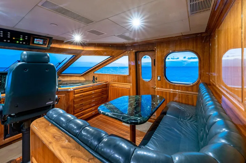 Amore Yacht Photos Pics Luxurious 2005 Christensen motor yacht interior with leather seating and ocean view.