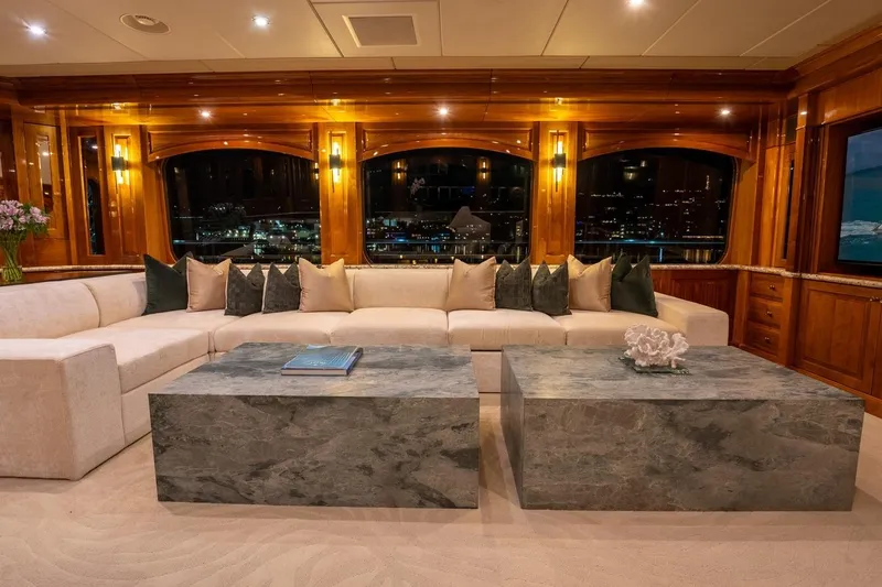 Amore Yacht Photos Pics Luxurious 2005 Christensen motor yacht interior with elegant seating and marble tables.