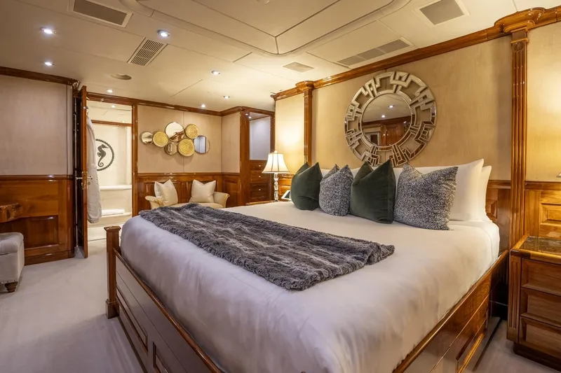 Amore Yacht Photos Pics Luxurious bedroom interior on 2005 Christensen Motor Yacht with elegant decor and plush bedding.