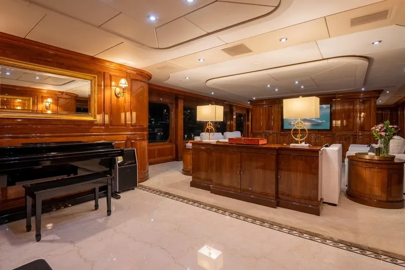 Amore Yacht Photos Pics Luxurious 2005 Christensen motor yacht interior with elegant wood paneling and modern lighting.