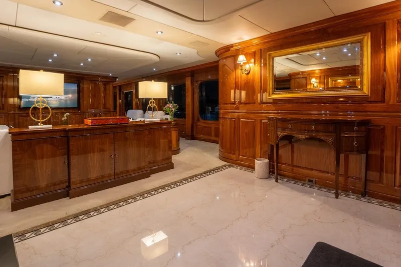 Amore Yacht Photos Pics Luxurious 2005 Christensen motor yacht interior with elegant wood paneling and modern lighting.