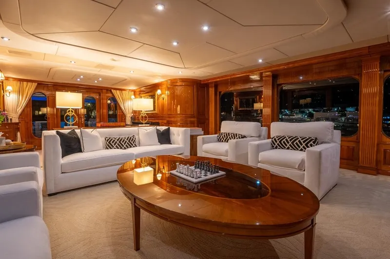 Amore Yacht Photos Pics Luxurious interior of 2005 Christensen motor yacht with elegant seating and wooden accents.