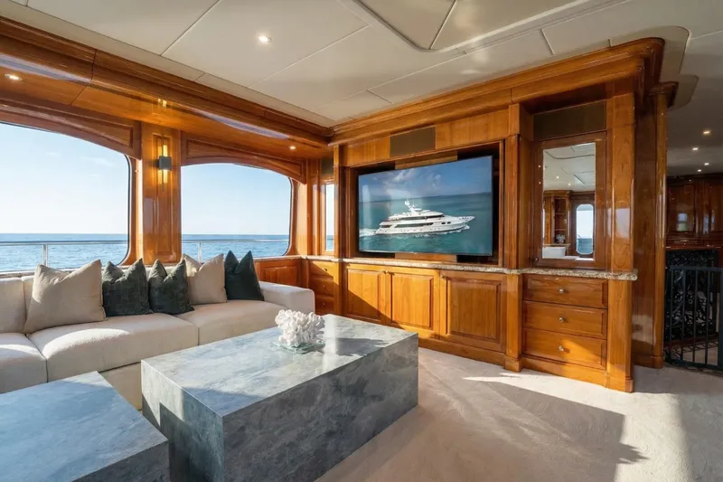 Amore Yacht Photos Pics Luxurious 2005 Christensen motor yacht interior with elegant wood paneling and ocean view.