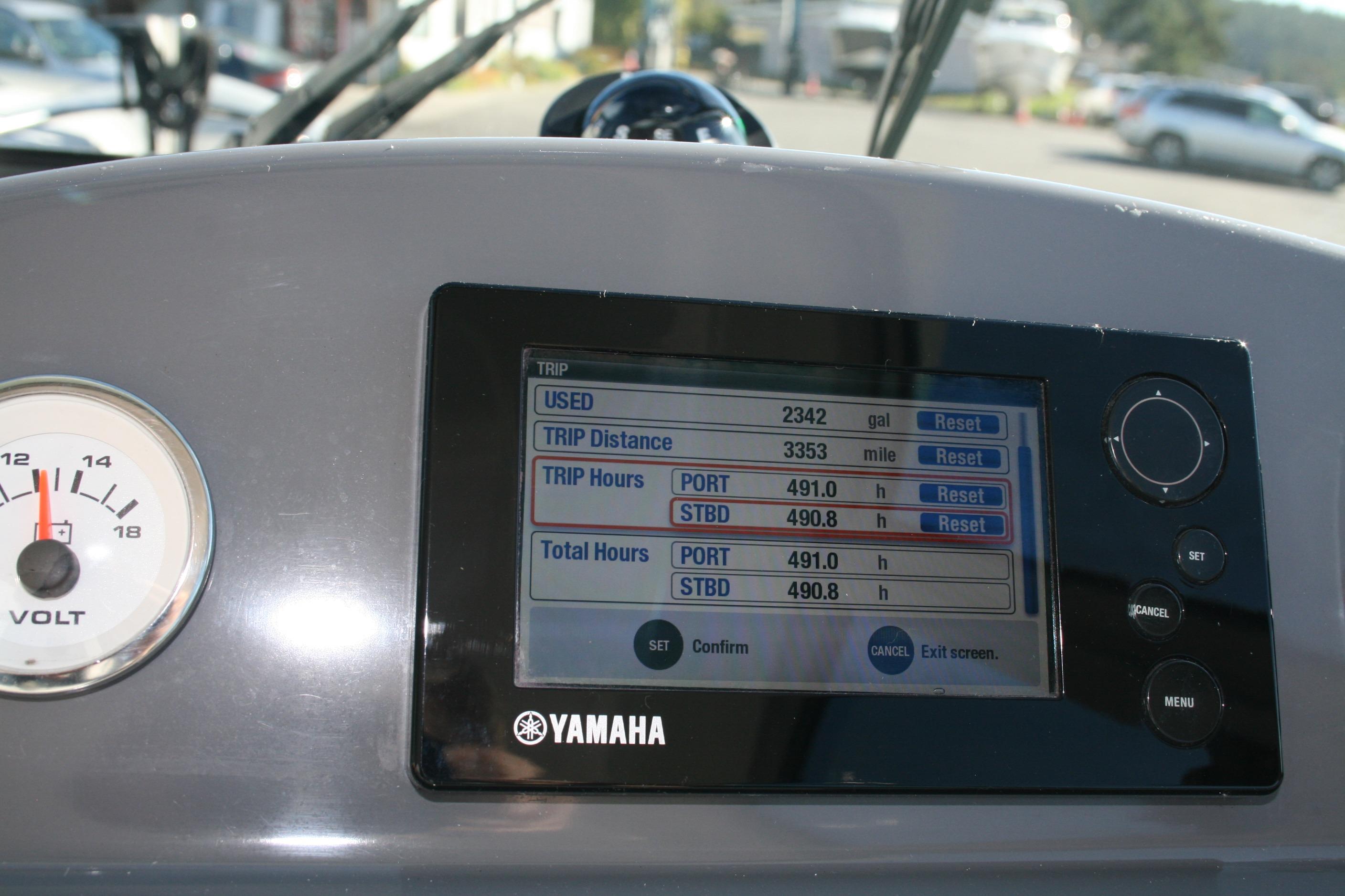 Dashboard of a 2012 Protector Targa 30 boat with Yamaha display and voltmeter.