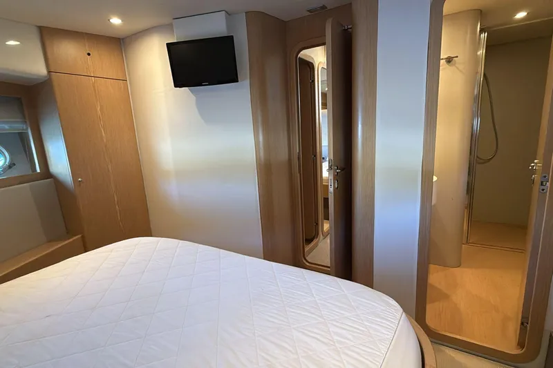  Yacht Photos Pics Luxurious cabin interior of 2013 Ferretti 620 yacht with modern amenities.