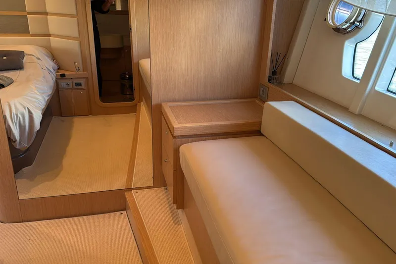  Yacht Photos Pics Luxurious interior of 2013 Ferretti 620 yacht with cozy seating and elegant design.