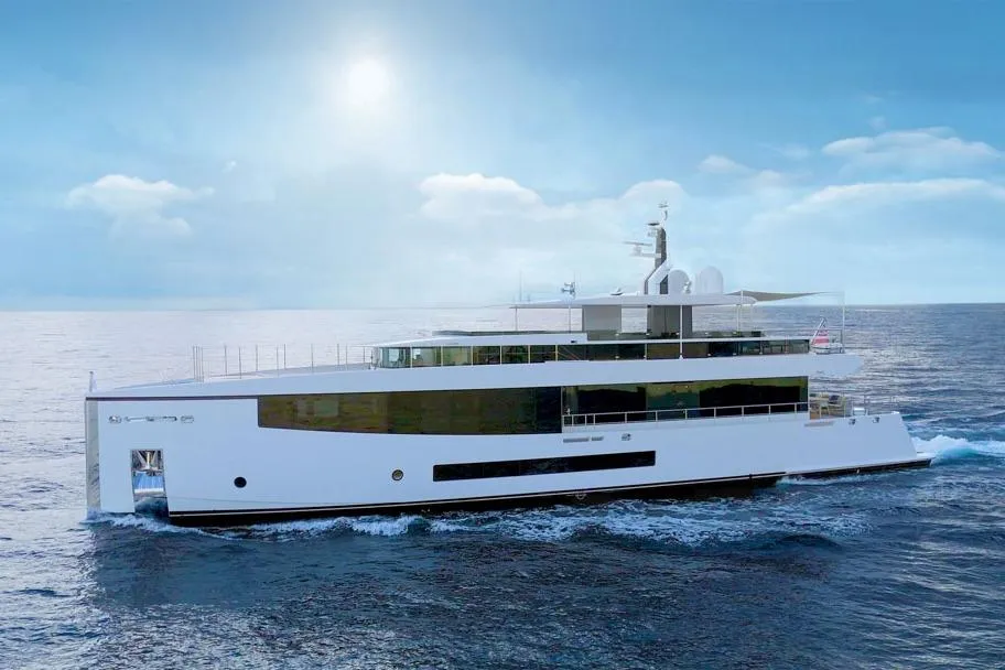 Luxurious 2016 Feadship Lagoon Cruiser yacht sailing under a clear blue sky.