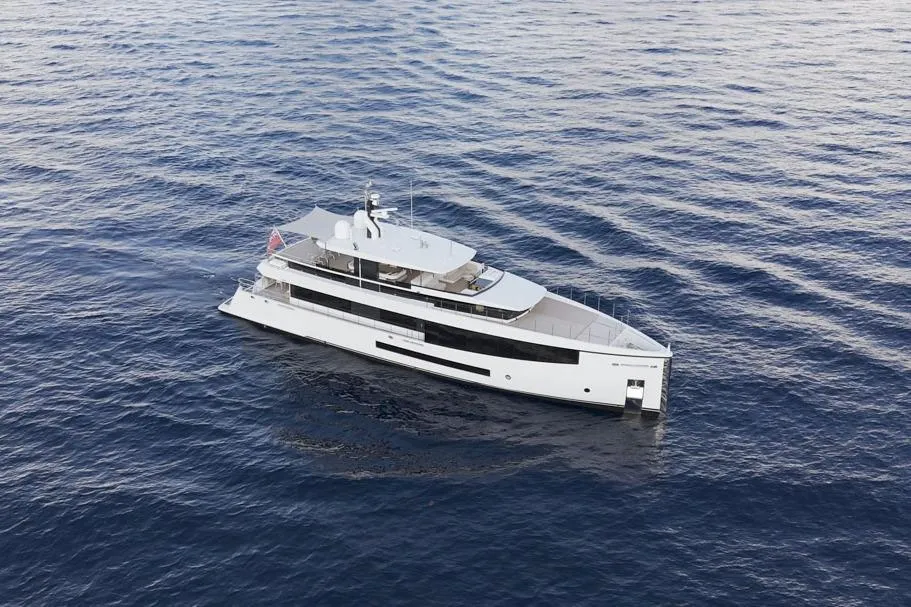 Luxurious 2016 Feadship Lagoon Cruiser yacht on calm ocean waters.