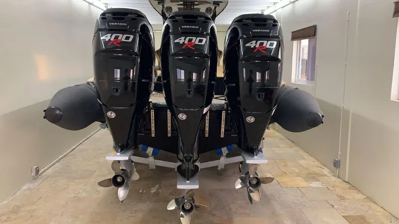  Yacht Photos Pics Triple Mercury 400R engines on a 2018 Bernico RX10 speedboat in a garage.