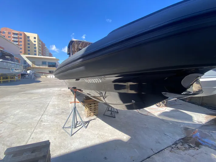  Yacht Photos Pics 2018 Bernico RX10 boat on dry dock under clear blue sky.