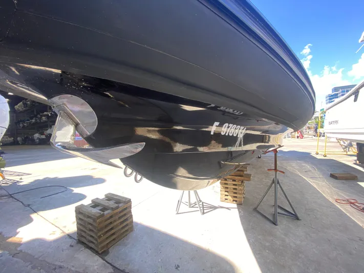  Yacht Photos Pics 2018 Bernico RX10 boat on dry dock, hull view, sunny day.