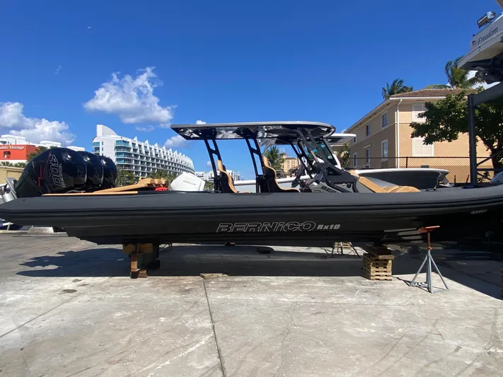  Yacht Photos Pics 2018 Bernico RX10 boat on dry dock under clear blue sky.