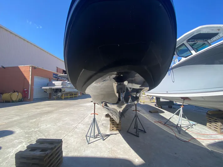  Yacht Photos Pics 2018 Bernico RX10 boat on stands in a sunny boatyard.