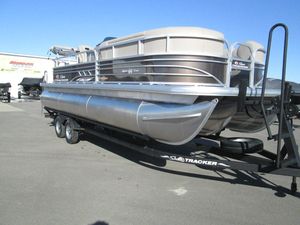 2023 Sun Tracker SPORT FISH 22 XP3 pontoon boat on a trailer.
