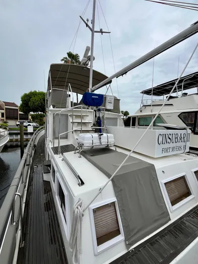  Yacht Photos Pics 1997 Grand Banks 49 Classic yacht docked, featuring a spacious deck and modern amenities.