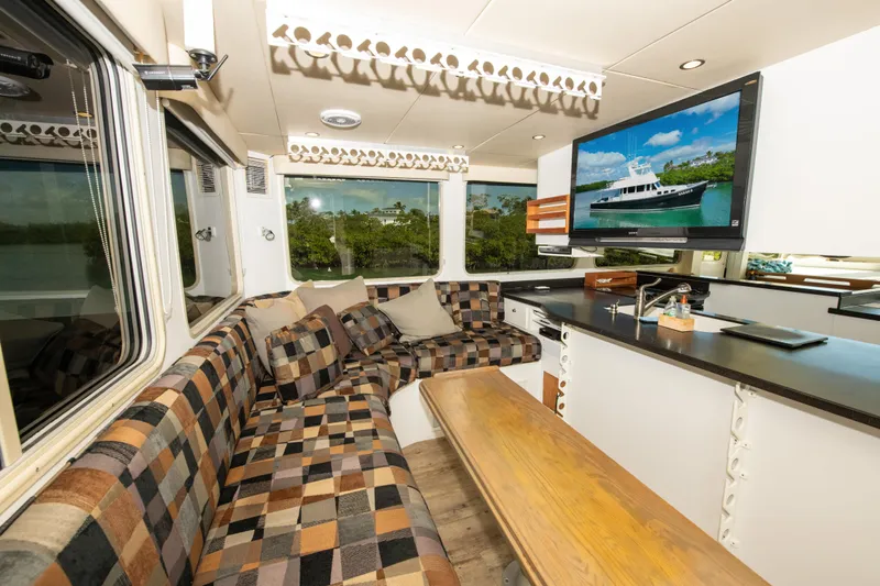 Sarah B Yacht Photos Pics Luxurious interior of 2007 Custom Carolina 58 Dixon Marine yacht with modern amenities.