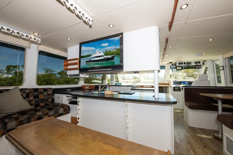 Sarah B Yacht Photos Pics Luxurious interior of 2007 Custom Carolina 58 Dixon Marine yacht with modern amenities and stylish design.