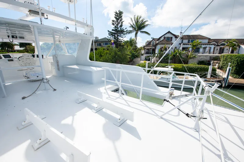 Sarah B Yacht Photos Pics 2007 Custom Carolina 58 Dixon Marine yacht deck with scenic waterfront view.