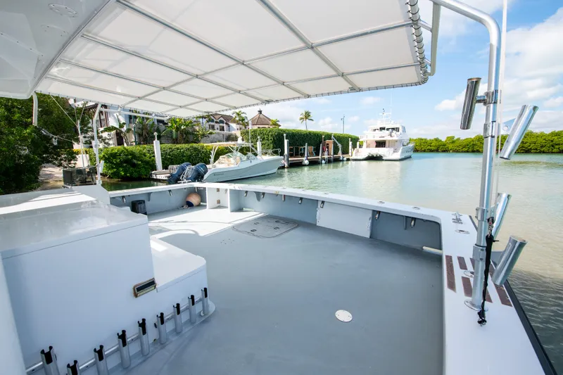 Sarah B Yacht Photos Pics Custom Carolina 58 Dixon Marine 2007 boat docked in a serene marina setting.