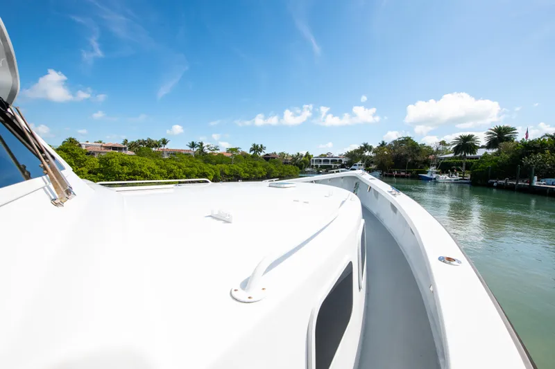 Sarah B Yacht Photos Pics Custom Carolina 58 Dixon Marine 2007 yacht cruising on a sunny day, scenic waterway view.